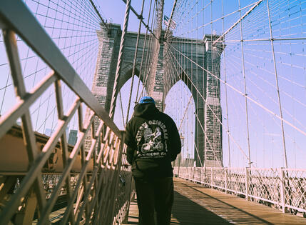 Stilow Originals Siclow Hoodie on the Brooklyn Bridge in New York.